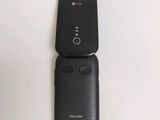 an image of a cell phone sitting on top of a table