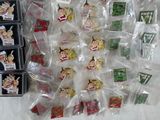 a lot of pins in plastic bags on a table