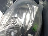 a plastic bag with a helmet inside of it