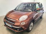 Une Fiat Fiorin marron est garée dans un garage