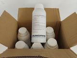 a cardboard box with a bottle of sunscreen sitting inside of it