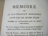 an old book with a black and white title on it