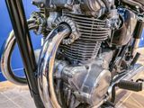 a close up of a motorcycle on display at a show