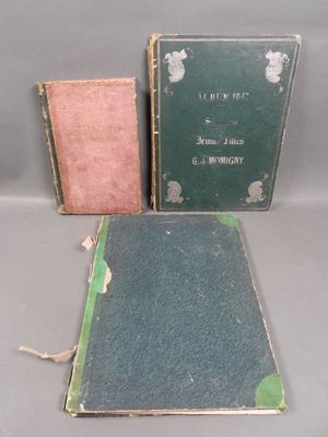 three books sitting on top of a table next to each other