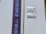 a picture of a ruler and a piece of paper on a table