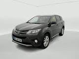 une Toyota RAV grise garée dans une pièce blanche