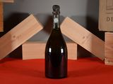 a bottle of wine that is sitting on a table