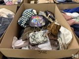 a box full of clothes and other items in it