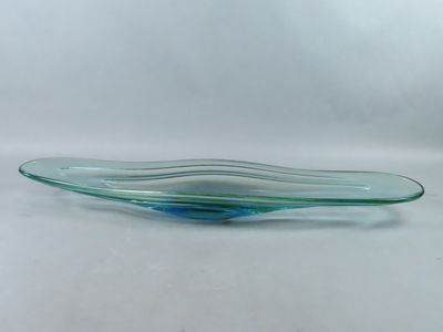 a close up of a glass bowl on a white surface