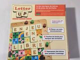 an image of a book with letters up written on it