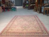a large rug in the middle of a room