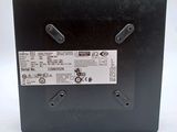a close up of the back of a black box with a label on it