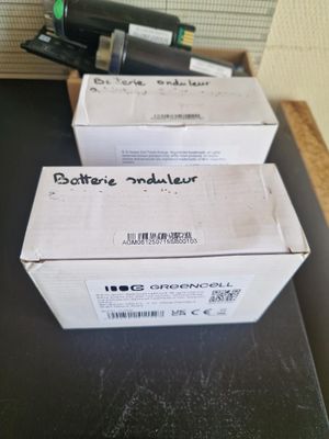 two boxes that are sitting on a table
