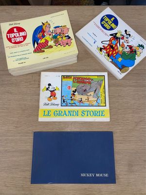 trois livres pour enfants sont posés sur une table les uns à côté des autres