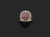 a ruby and diamond cluster ring