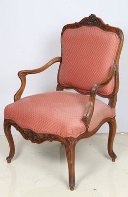 an image of a chair with a pink upholstered upholstered seat