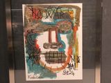 a picture of a picture of a guitar with graffiti on it