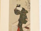 an old book with a picture of a woman in a kimono