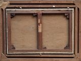 an old picture of a picture frame with two wooden frames