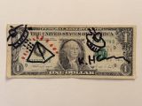 a one dollar bill with graffiti written on it