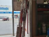 a ladder leaning up against a wall in a garage