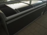 a bed that is sitting in the middle of a room