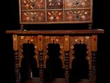 an image of a wooden table with drawers and drawers on it
