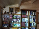 a room with a lot of books on the shelves