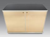 an image of a black and gold sideboard with two doors