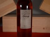 a bottle of wine that is sitting on a table
