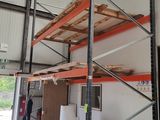 a picture of a large warehouse with a lot of shelves
