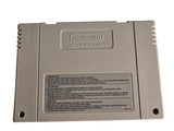 a nintendo game console sitting on top of a white table