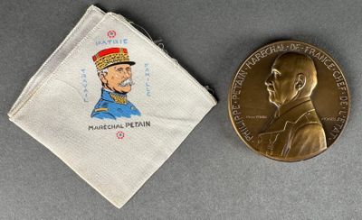 an image of a medal and a coin sitting next to each other