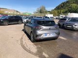 a lot of cars parked in a parking lot on a sunny day