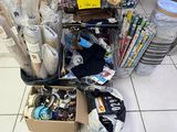 a cart full of items on the floor of a store