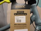 a tag attached to a bike that says thanks for choosing us