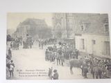an old picture of a horse drawn carriage on the street