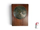 a plaque with a picture of a lion on it