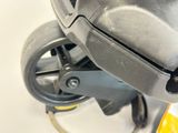 a close up view of a wheel on a stroller