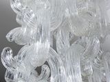 a close up of a glass sculpture of a spiral design