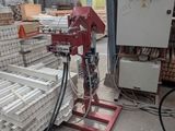 a machine that is sitting in the middle of a warehouse