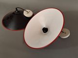 a white and red light that is on top of a table