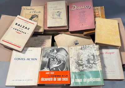 many books that are sitting on top of a table