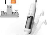a close up of a vacuum cleaner with a toothbrush and toothpaste
