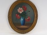 une peinture de fleurs dans un vase bleu sur une table