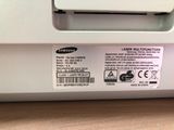 a label on the back of a printer that says laser printer