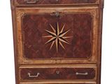 an image of a chest of drawers with a clock on top of it