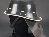 a helmet on a mannequin head with a visor
