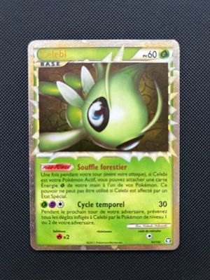 a close up of a pokemon card on a table