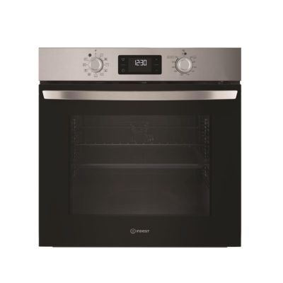 the oven is built into the wall with the door open